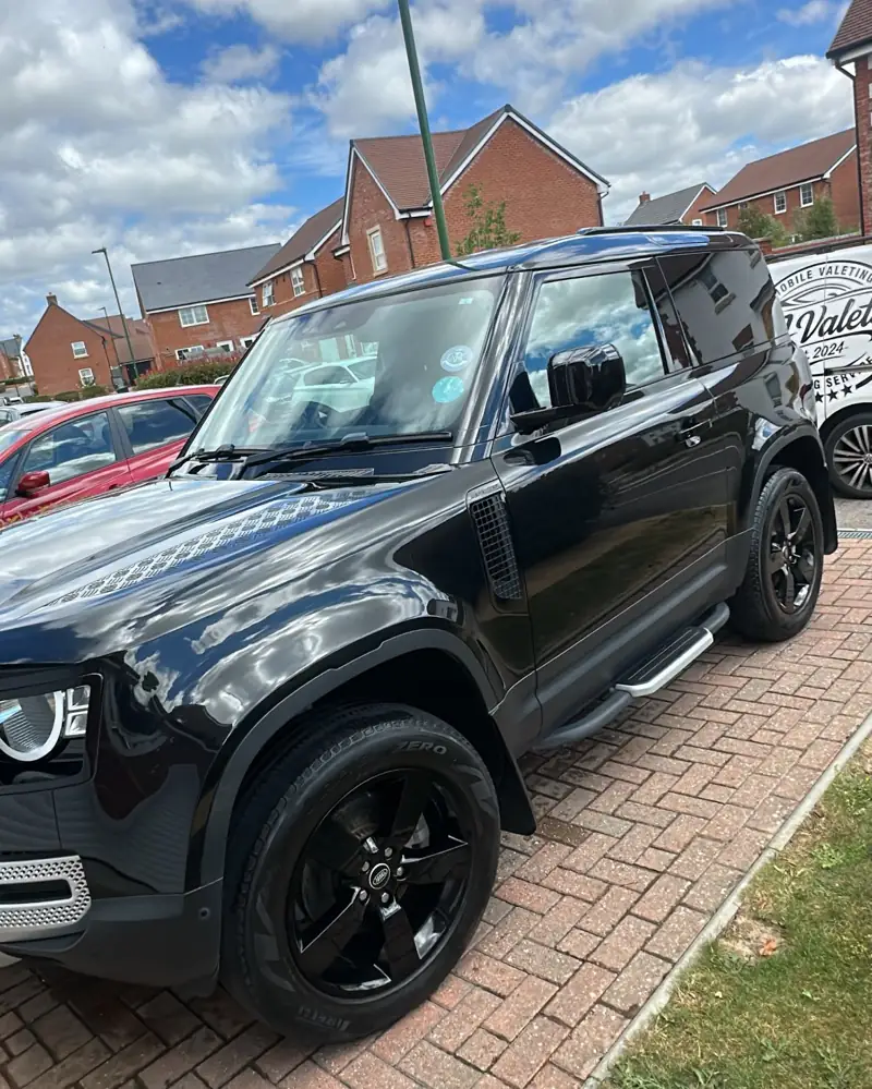 Black Land Rover Defender 4x4 after a maintenance valet by JJ Valets, Chichester